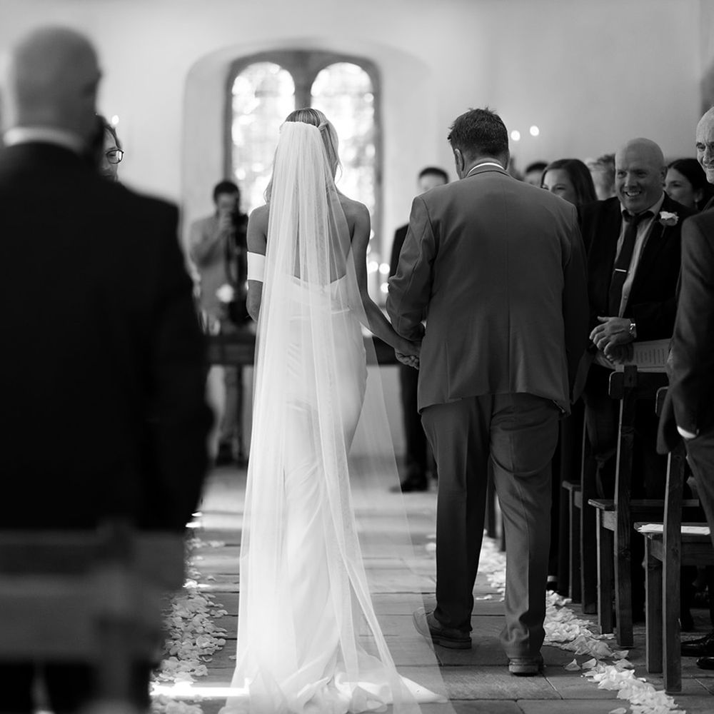 father-of-the-bride-walks-bride-down-the-aisle