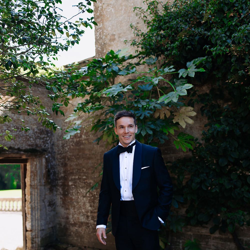 groom-wearing-black-tuxedo