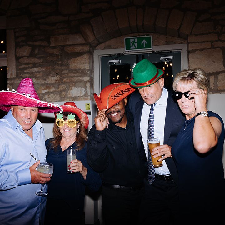 wedding-guests-wearing-photo-booth-props