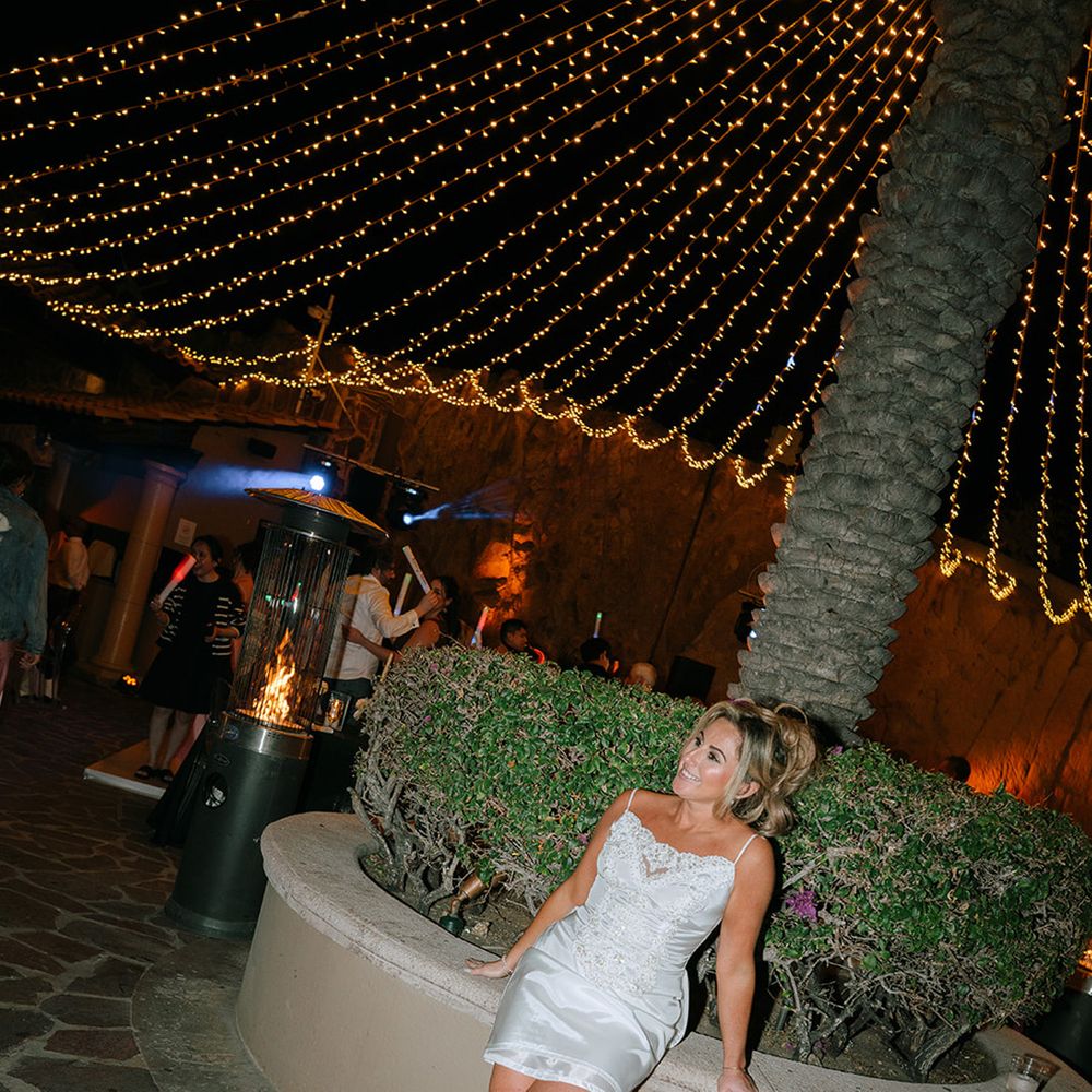 bride-in-short-wedding-reception-dress-and-trainers