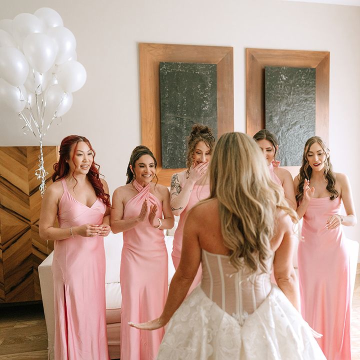 bridesmaids-react-to-seeing-bride-for-first-time