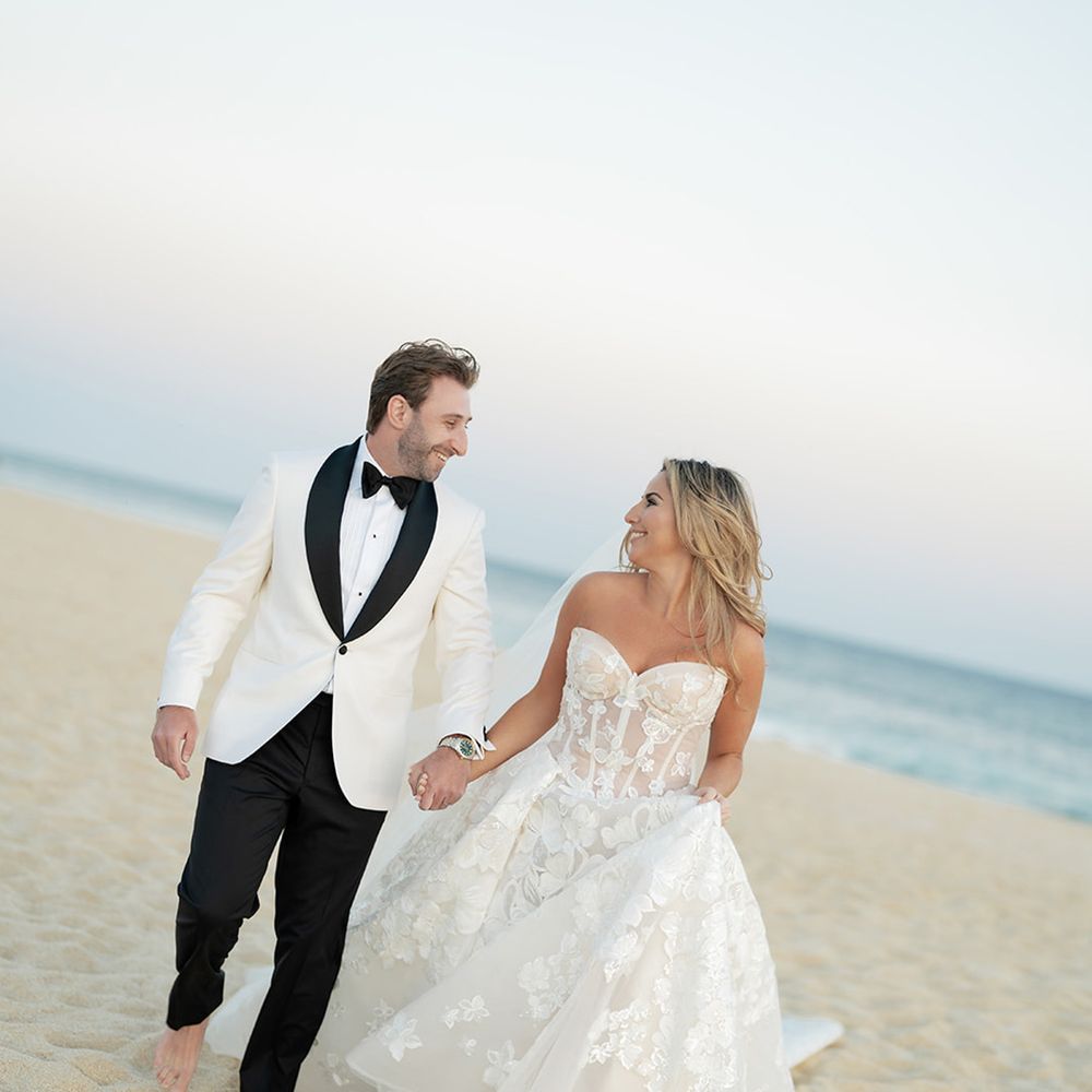 cabo-destination-wedding-with-couple-walking-on-beach