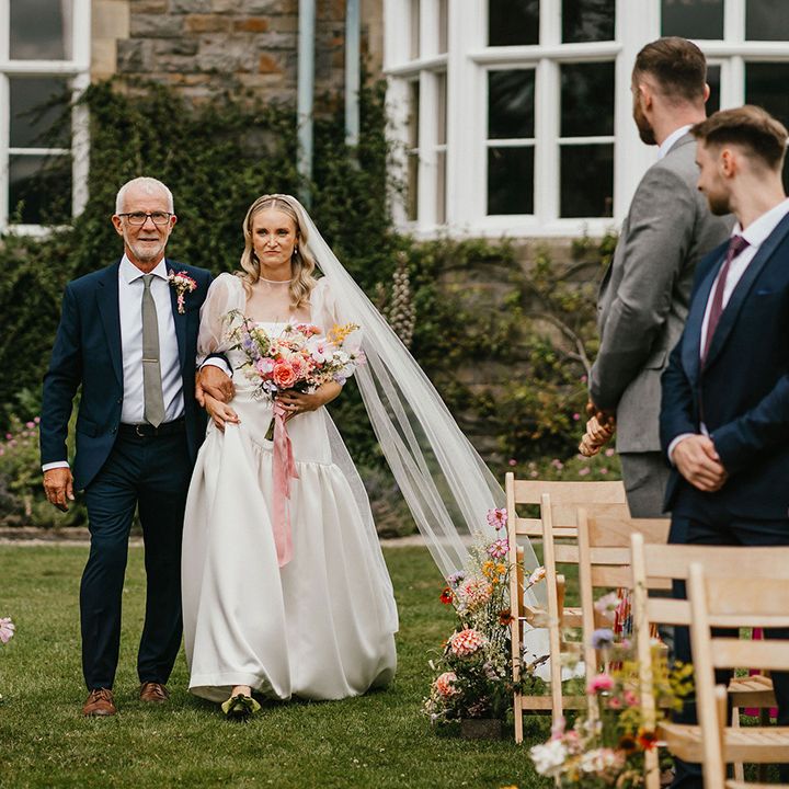 father-of-the-bride-walks-bride-down-the-aisle