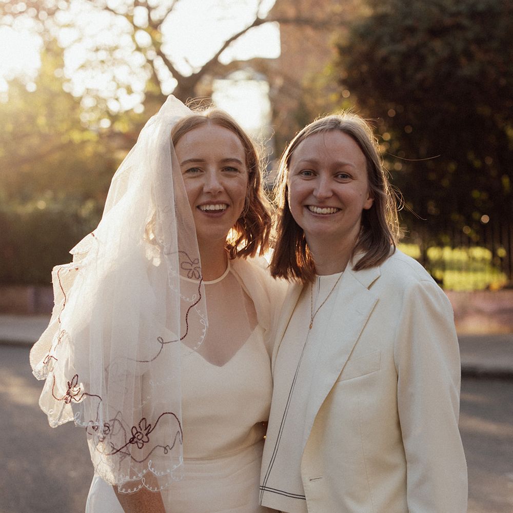 bride-in-dress-and-bride-in-wedding-suit