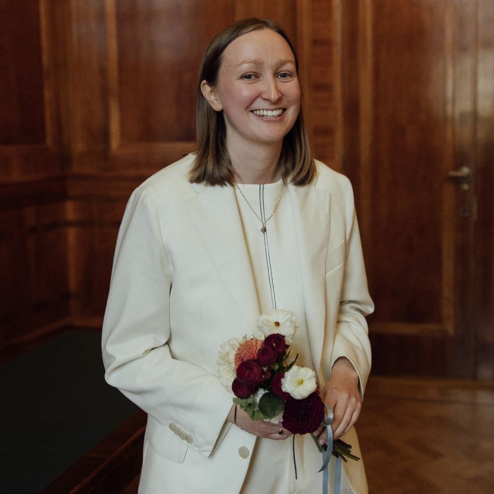 bride-in-suit-for-town-hall-wedding