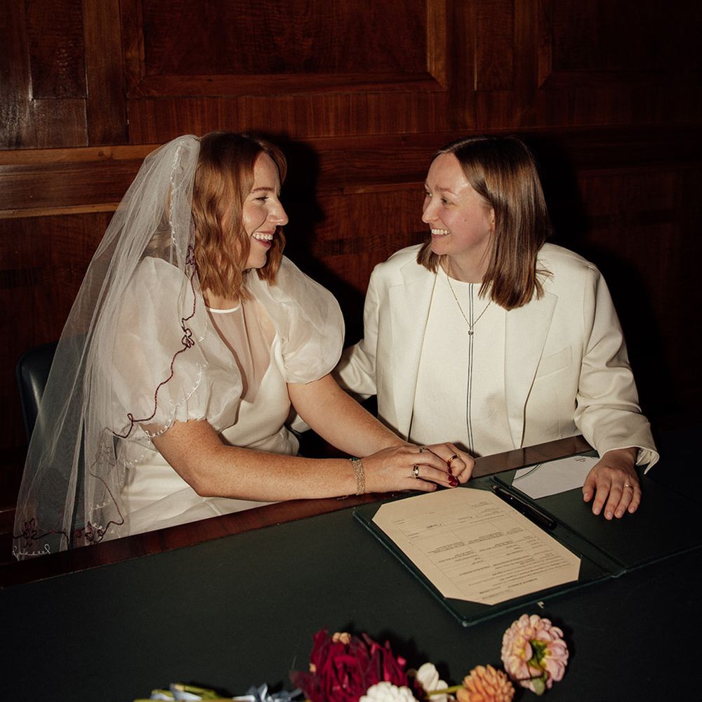 brides-sign-the-wedding-register