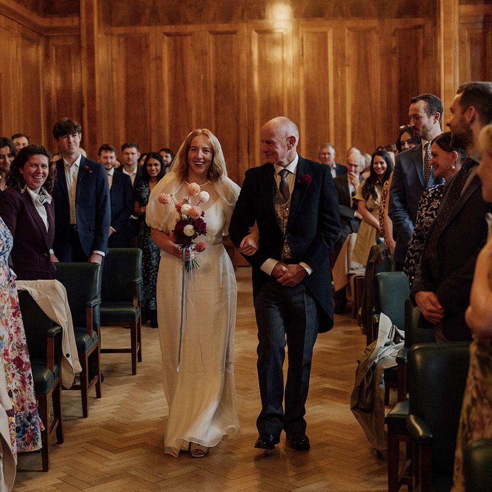 father-of-the-bride-walks-bride-down-aisle