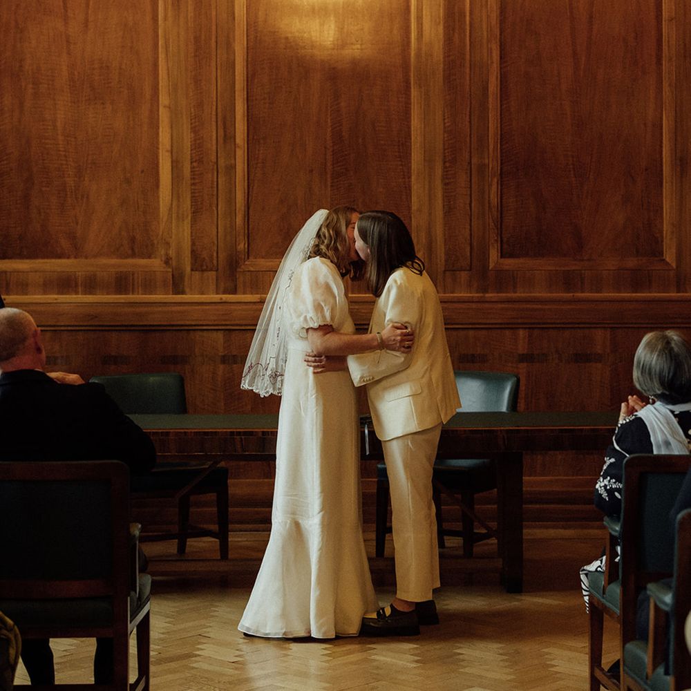 first-kiss-for-brides-at-town-hall-wedding