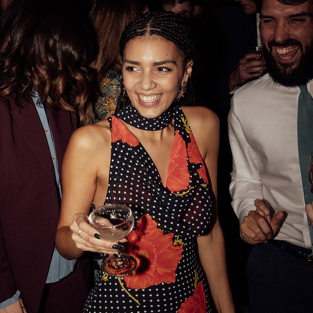wedding-guest-in-polka-dot-red-flower-dress