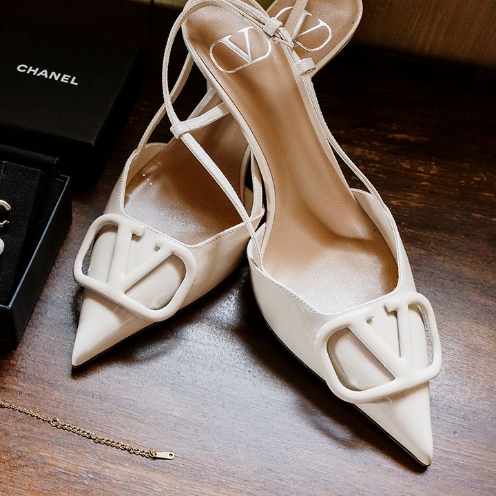 Valentino slingback leather shoes with Chanel earrings and perfume bridal accessories