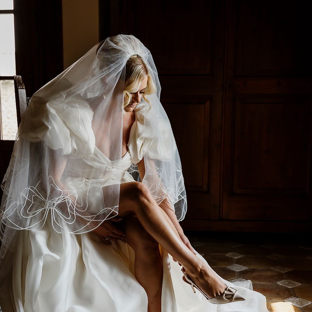 bride-wearing-Valentino-Garavani-VLogo-Signature-Patent-Leather-Slingback-Pumps