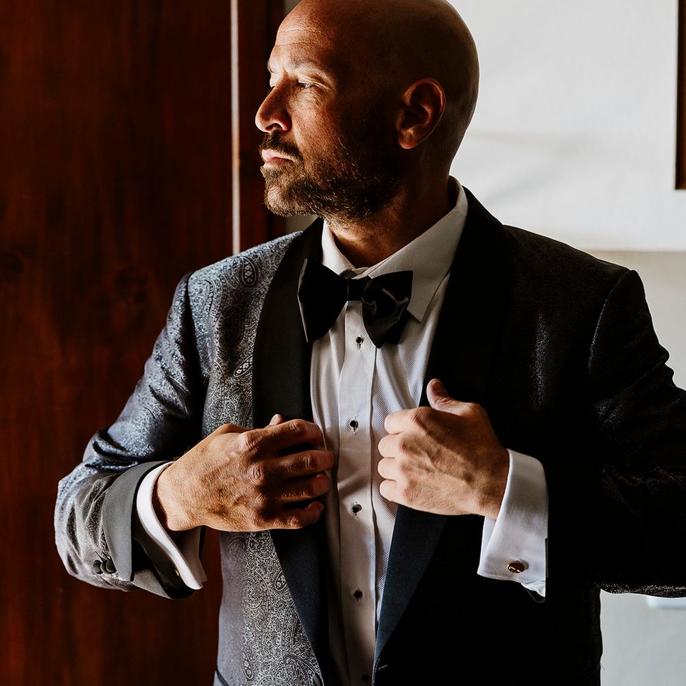groom-wearing-paisley-patterned-wedding-suit
