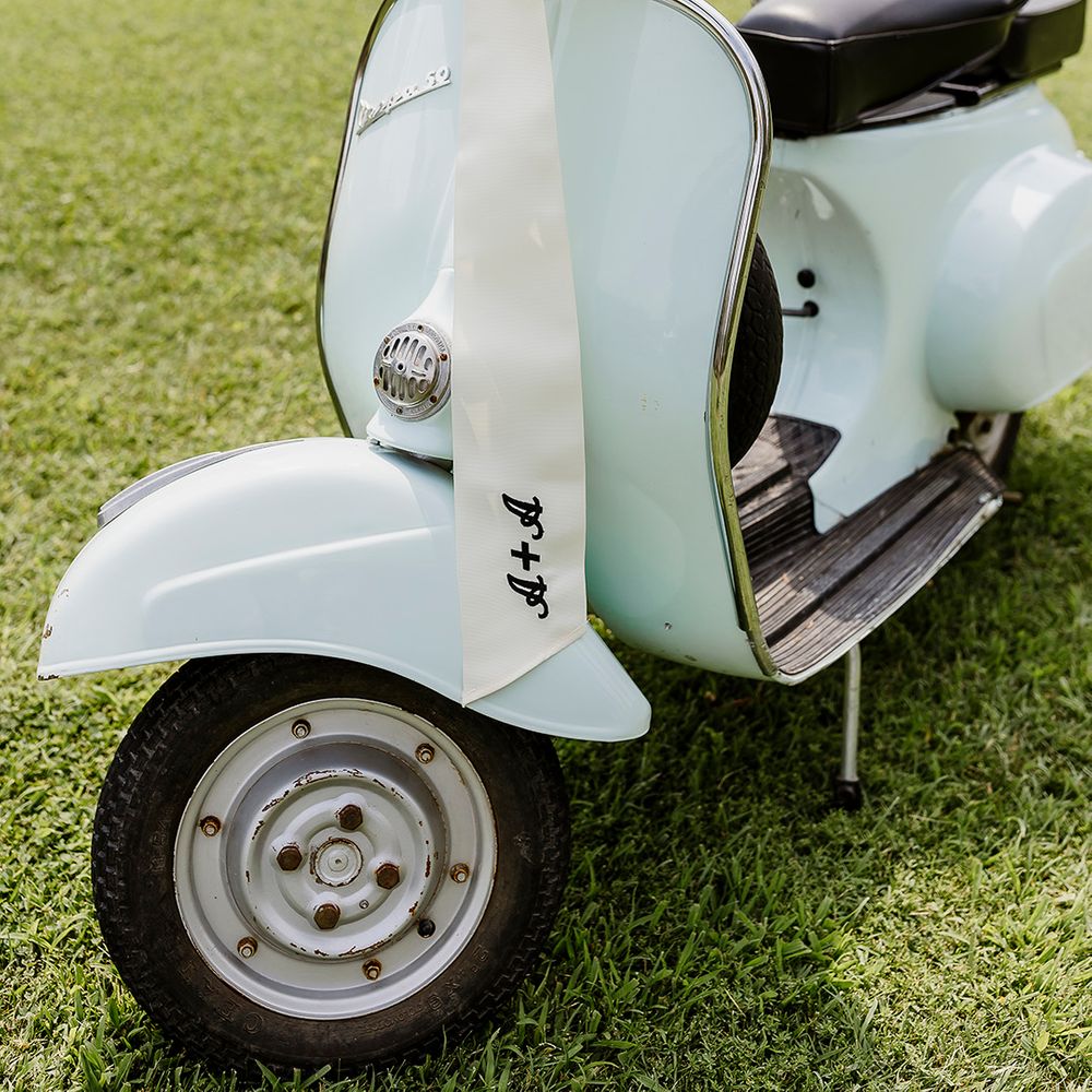 vespa-decorated-with-white-bow-wedding-decor