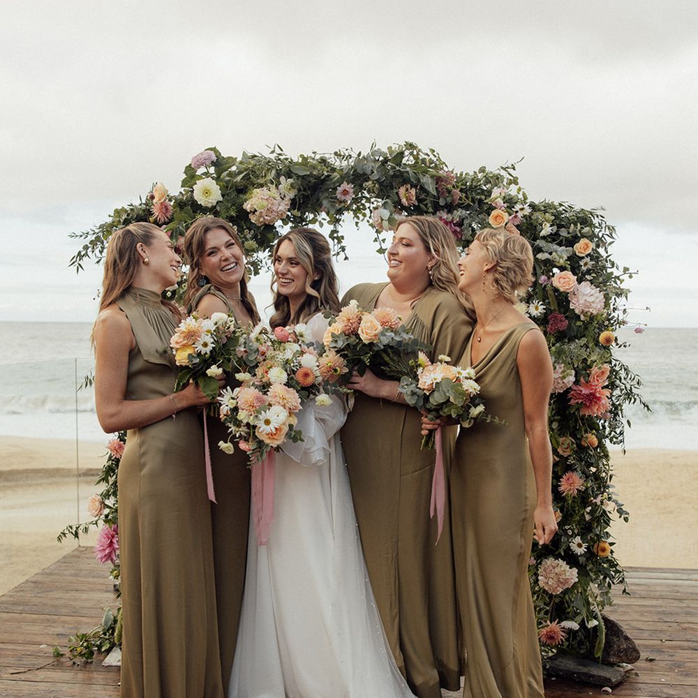 bridal-party-wearing-green-bridesmaid-dresses