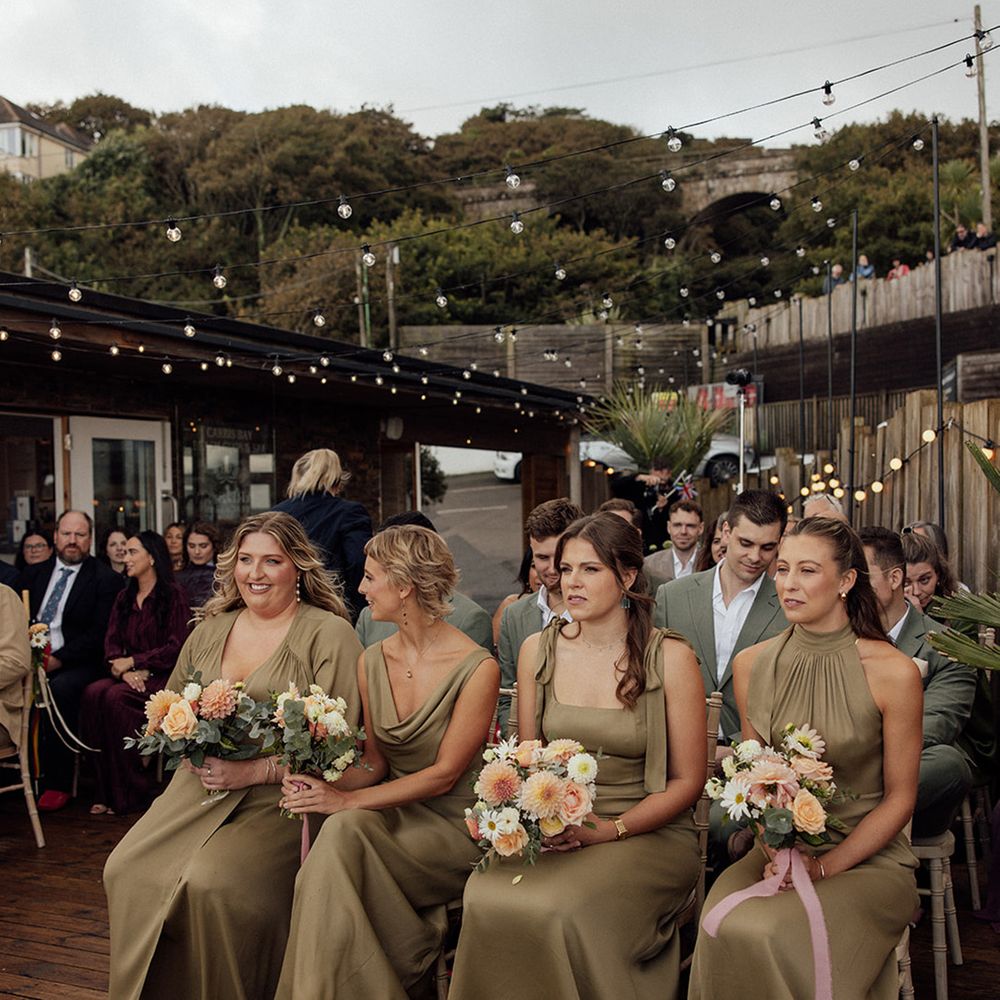 bridesmaids-in-sage-green-satin-dresses