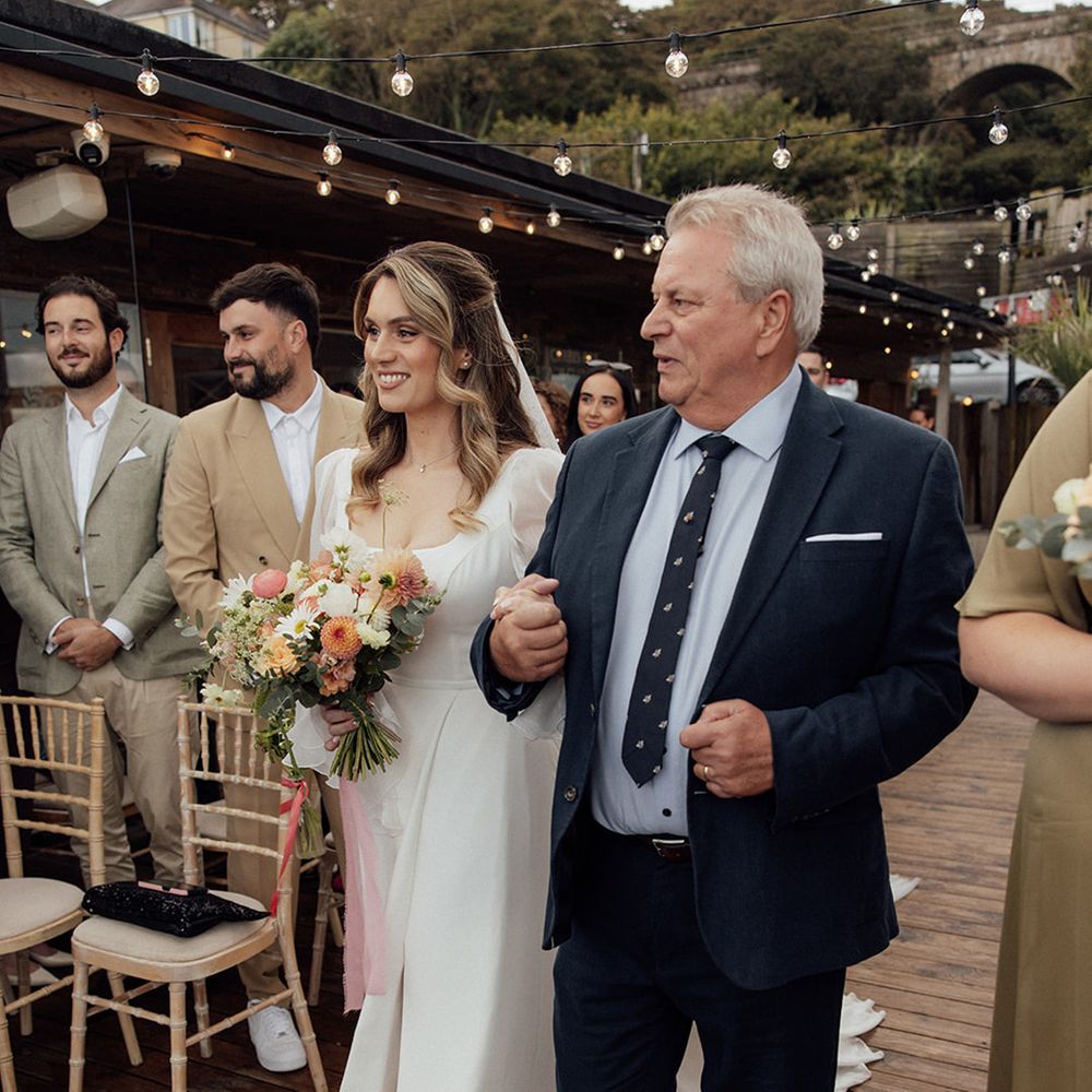 father-of-the-bride-walks-bride-down-the-aisle