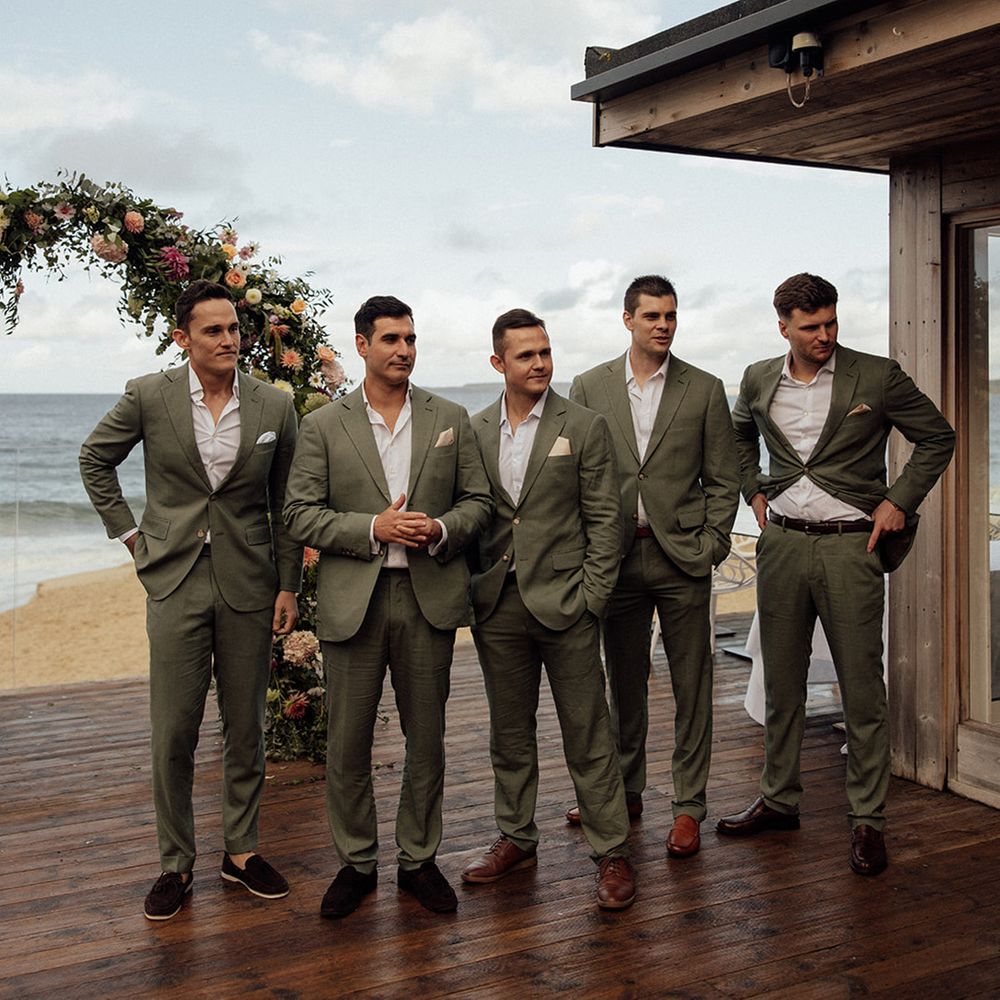 groomsmen-in-green-wedding-suits
