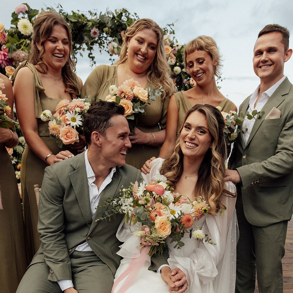 wedding-party-in-green-suits-and-dresses