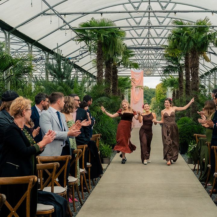 bridesmaids-dance-down-the-aisle-together.