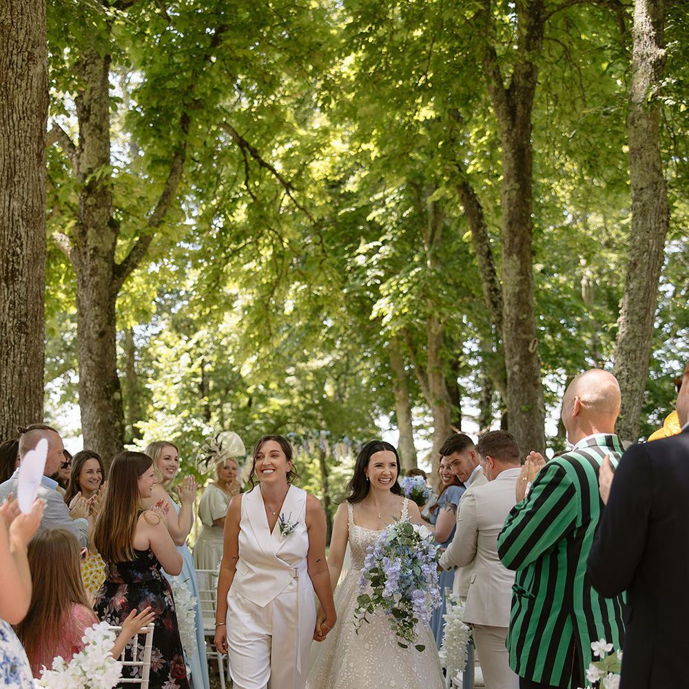Brides walk back down the aisle as married couple 
