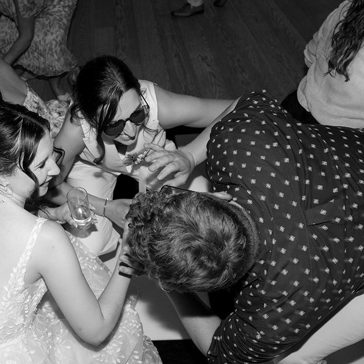 Guests dancing at wedding reception 