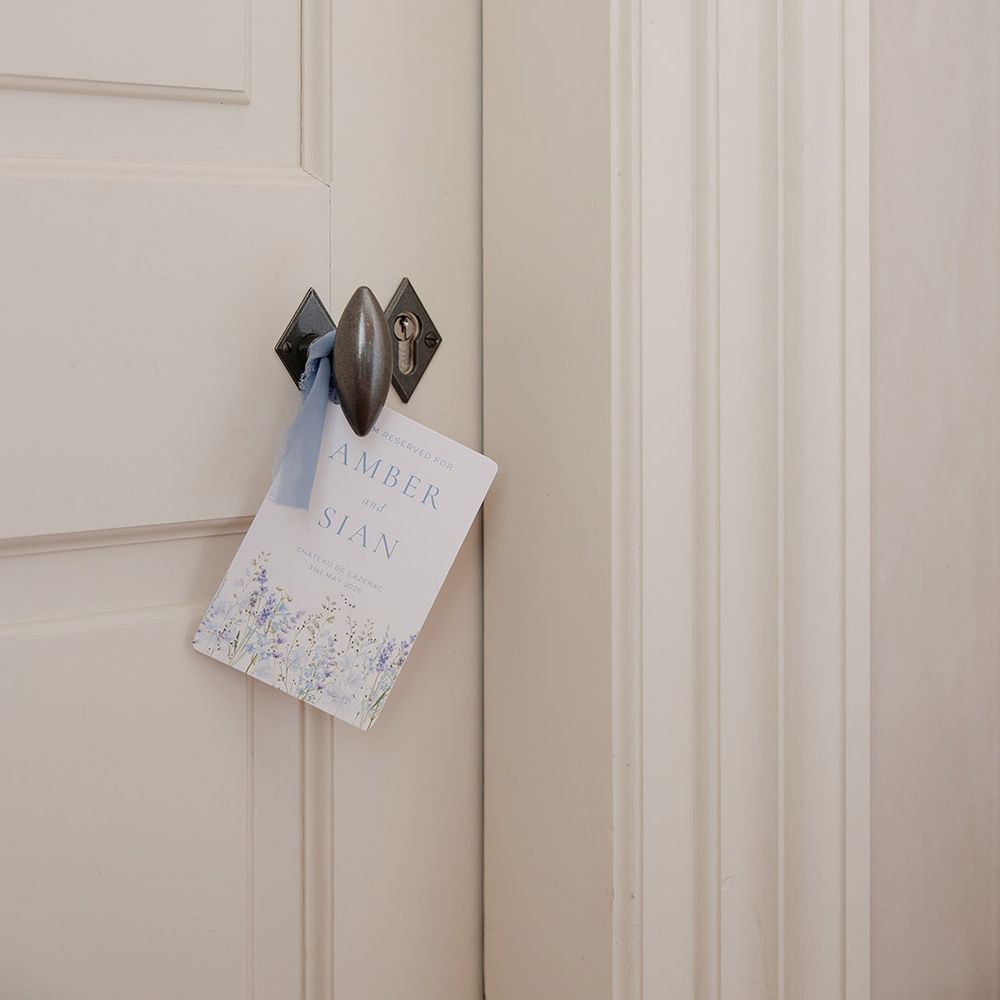 room-reservation-sign-with-blue-ribbon