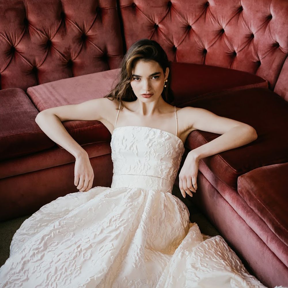 Full skirt maxi wedding dress with spaghetti straps