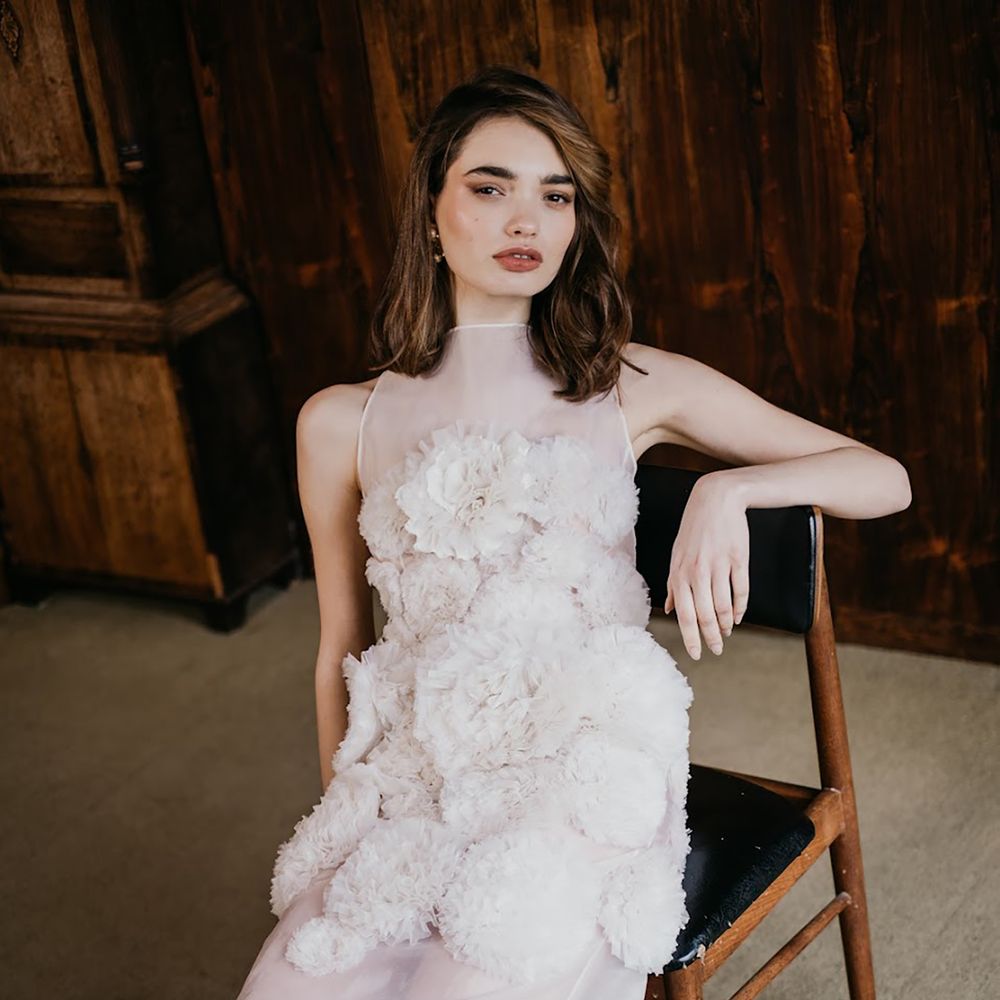 Sheer wedding dress with 3d flowers 