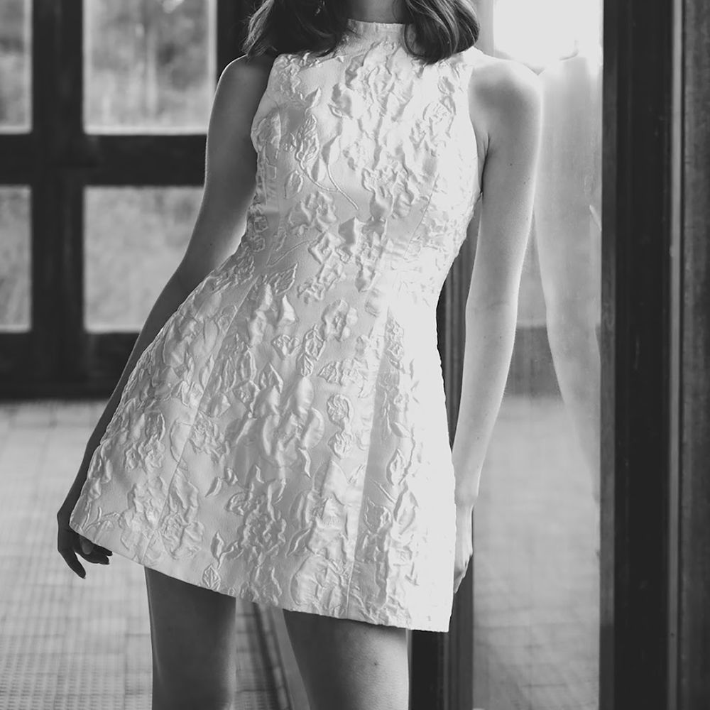 Short wedding dress with high neck and patterned fabric