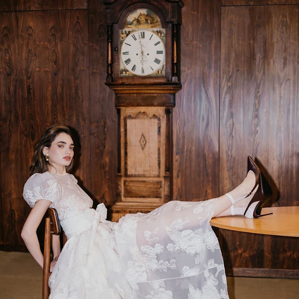 Sheer floral wedding dress with puff sleeves