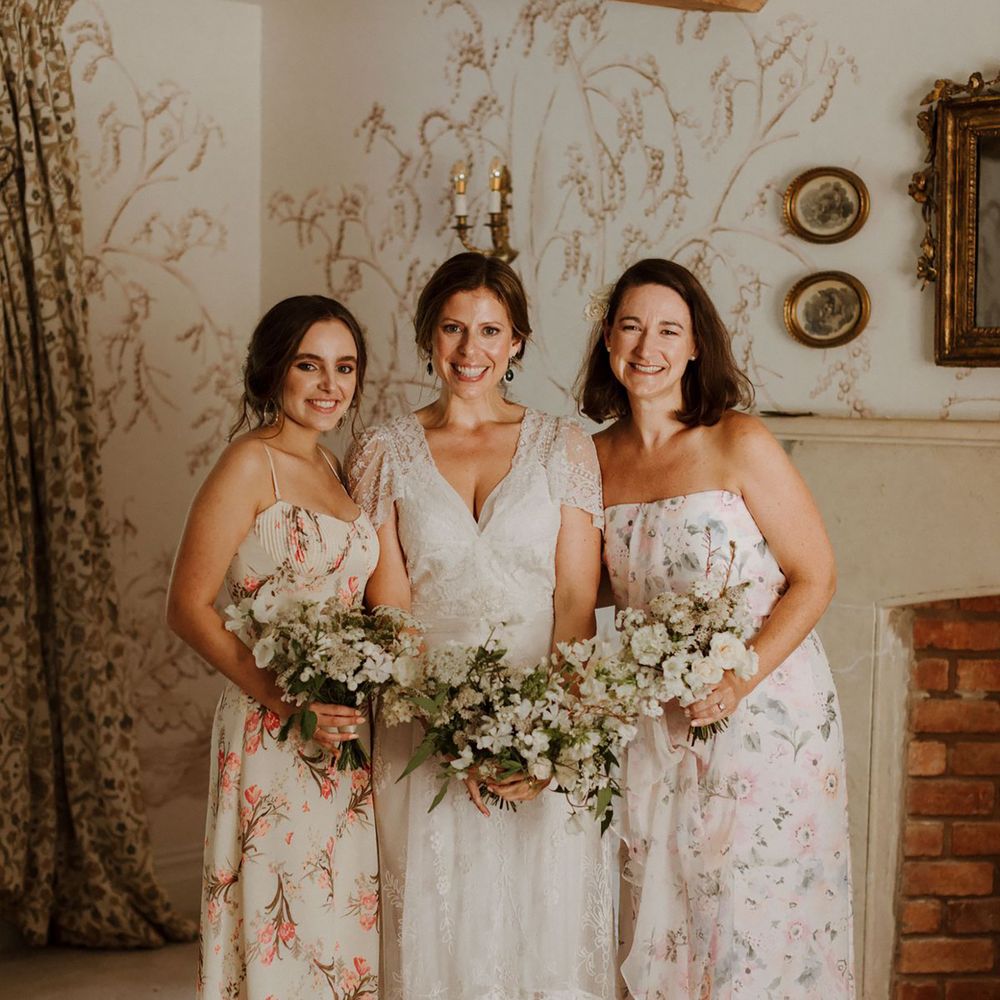 Rustic spring wedding dress and floral bridesmaid dresses