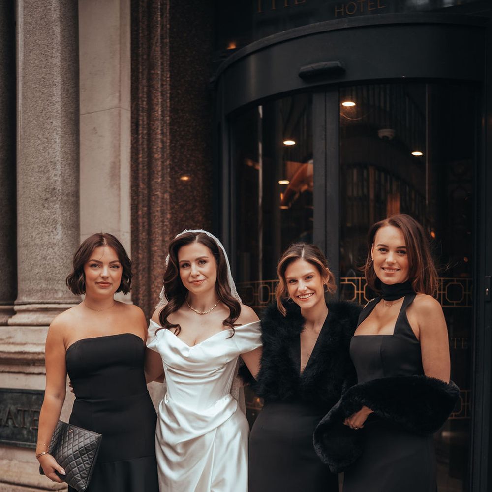 Bridal party in black bridesmaid dresses for bridal party 