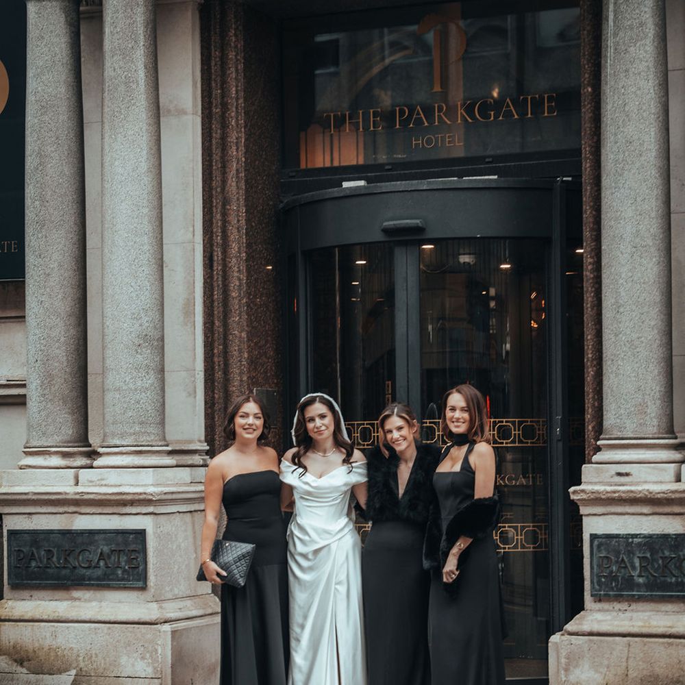 Bridal party with black bridesmaid dresses