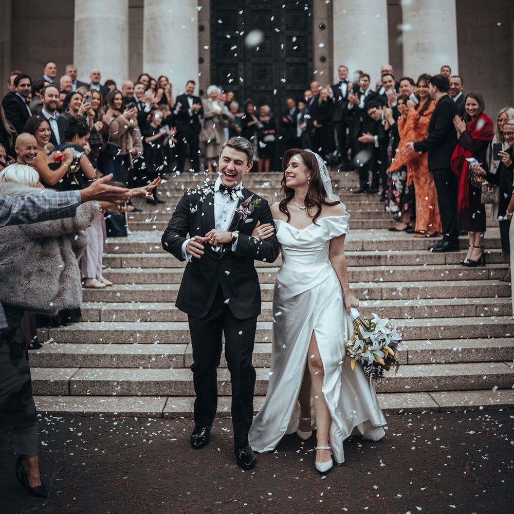 Confetti exit after museum wedding ceremony 
