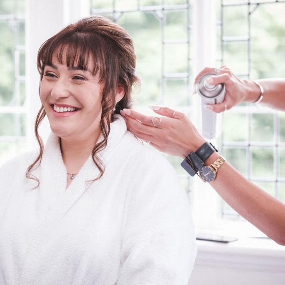 Bride having a wedding hair trial with her hairstylist