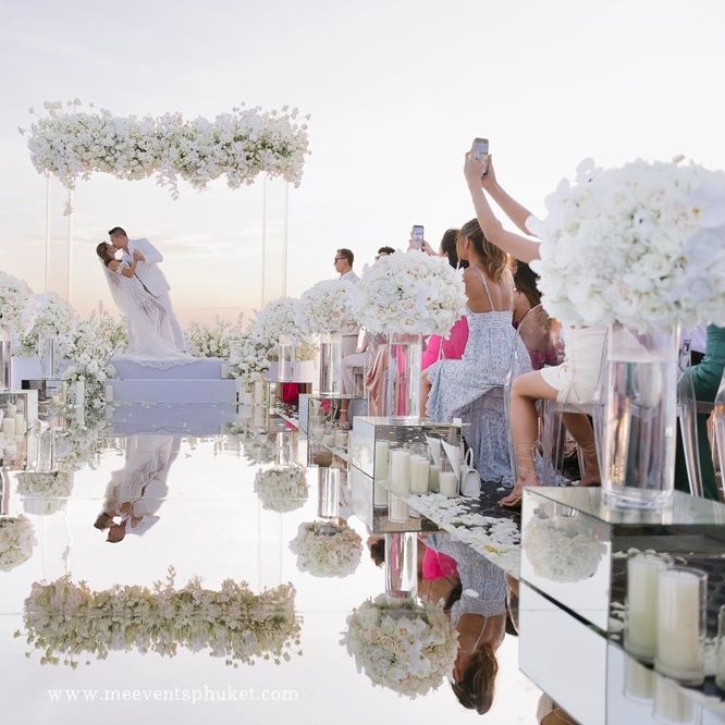 Sri Panwa wedding with mirror aisle and flower arch