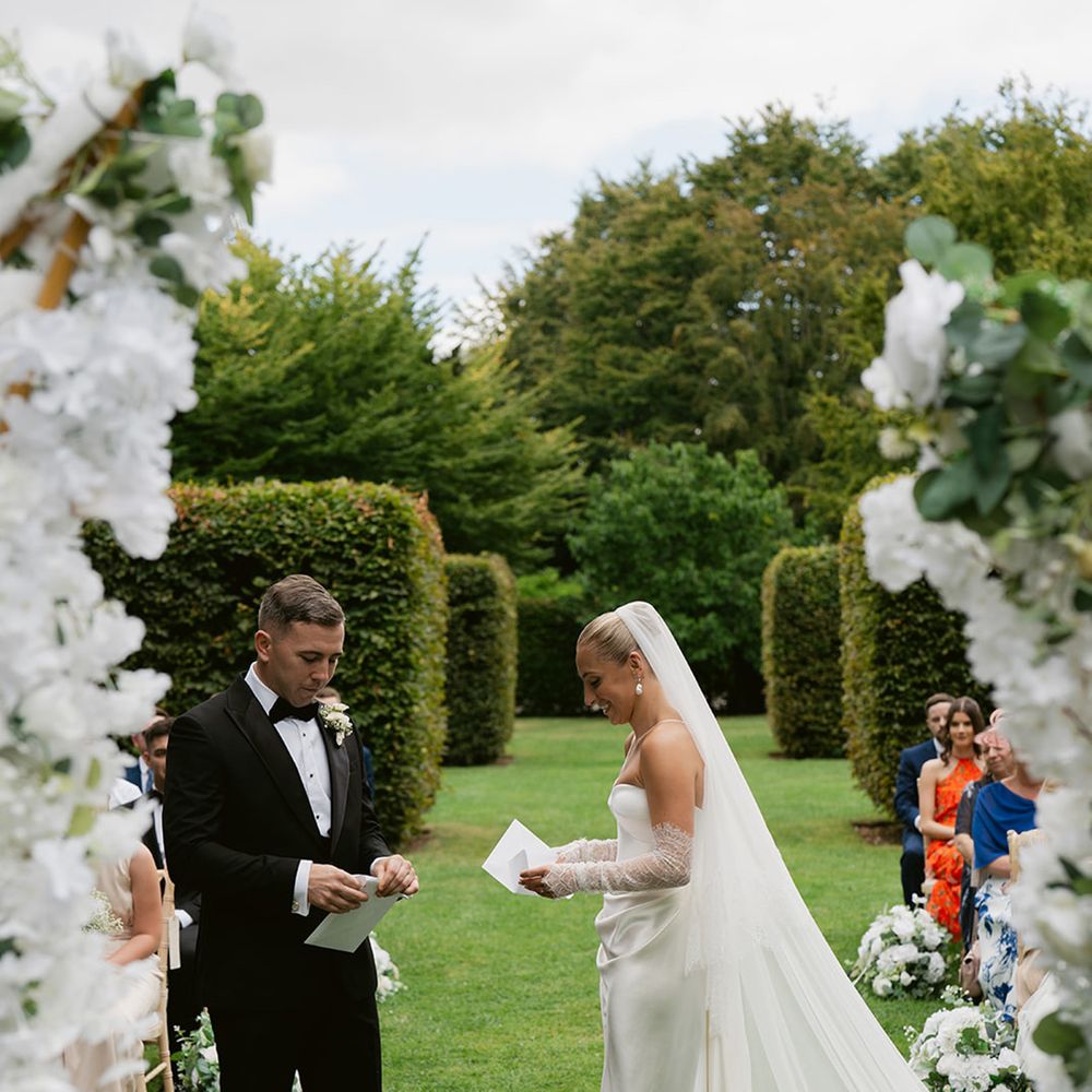 Bride and groom exchange wedding vows 