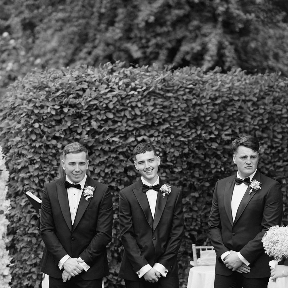 Groom reacts to seeing bride walk down the aisle 