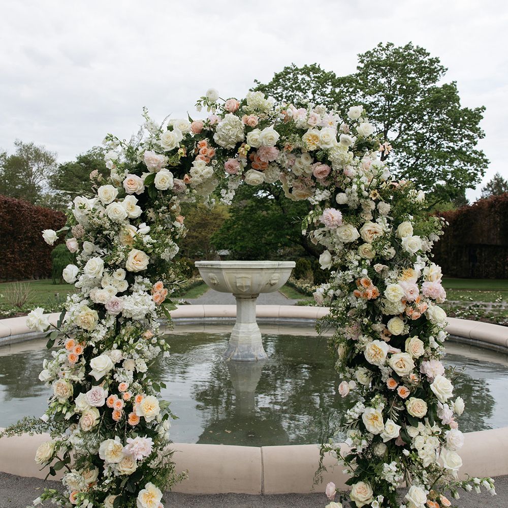 Cream and pink flower arch wedding altar decor 