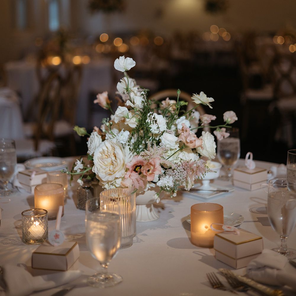 Neutral wedding table floral centrepiece 