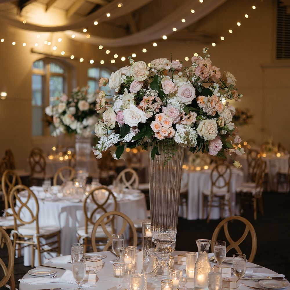 Tall floral wedding table centrepiece 