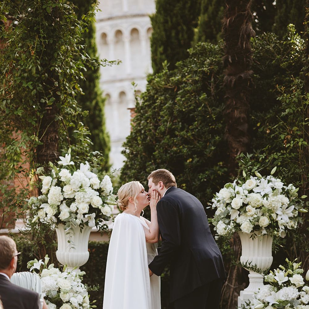 First kiss for couple on wedding day 