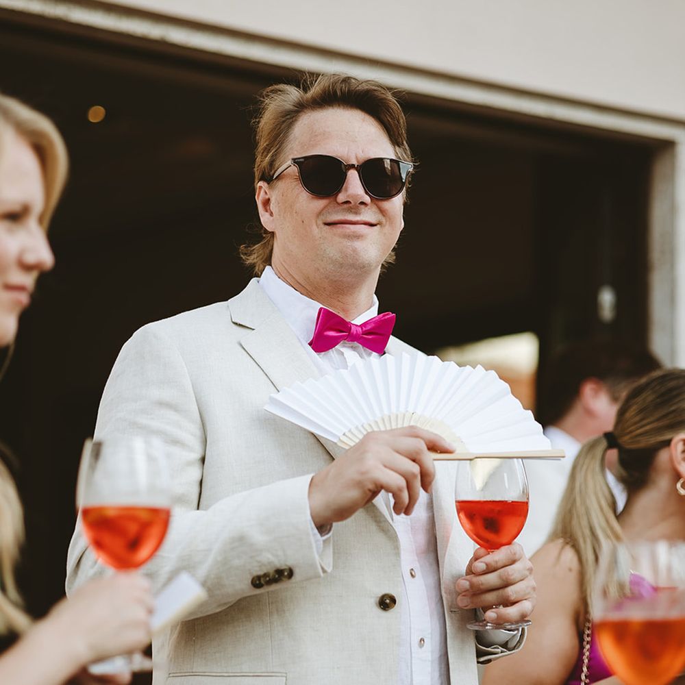 Guests drinking wedding cocktails