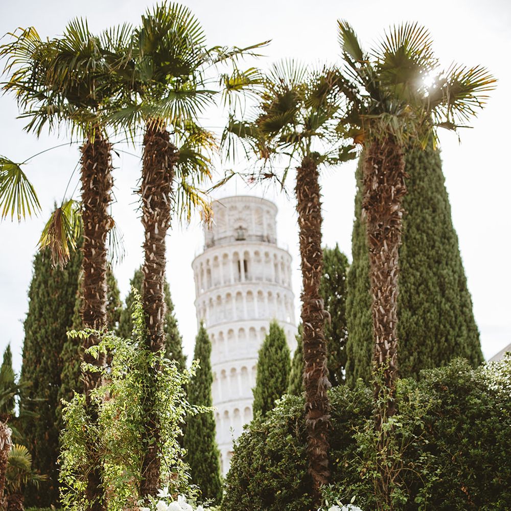 Leaning tower of Pisa wedding ceremony in secret garden