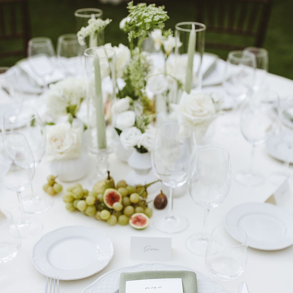 Sage green and white wedding place setting 