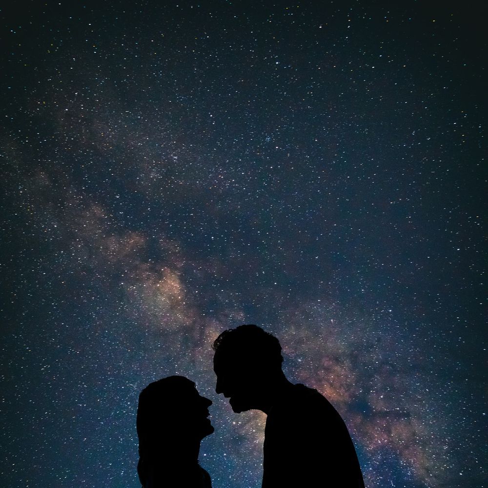 Silhouette of couple under the stars