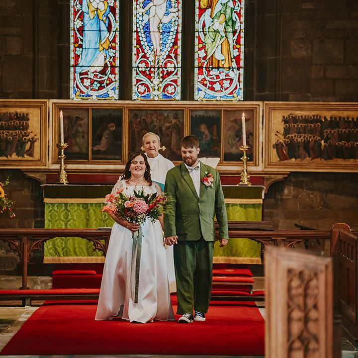 Couple walks back down the aisle as a married couple 