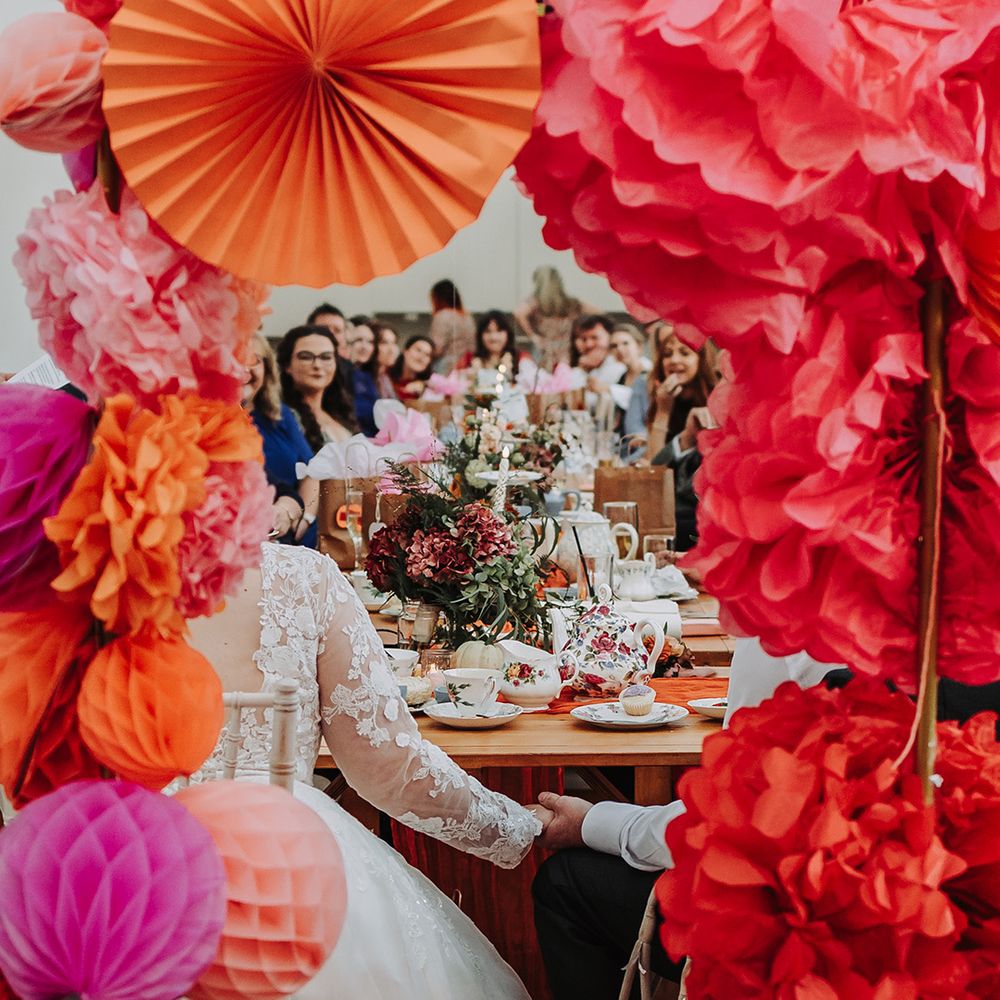 Pink and orange paper wedding decorations 