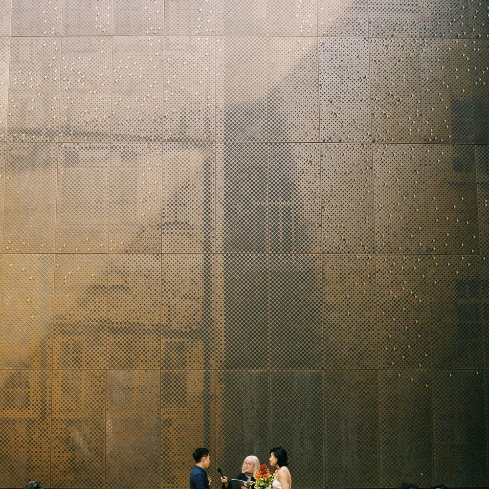 bride and groom getting married in hackney