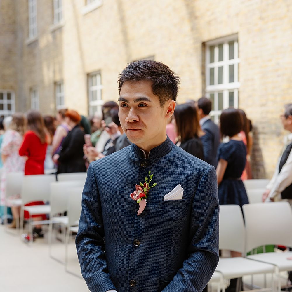 groom waiting at altar
